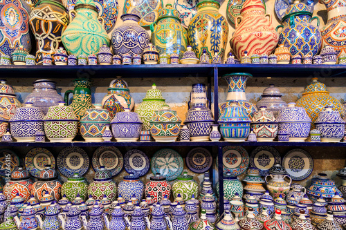 Colorful ceramic souvenirs on a shelf in a shop in Morocco © pwollinga