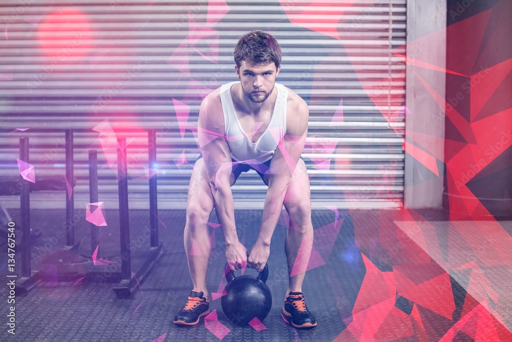 Naklejka premium Fit man lifting dumbbells