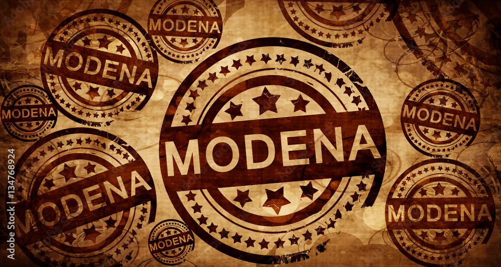 Modena, vintage stamp on paper background