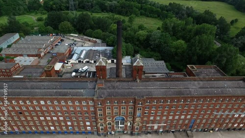 Drone shot of a old industry chimney in Manchester, England, back