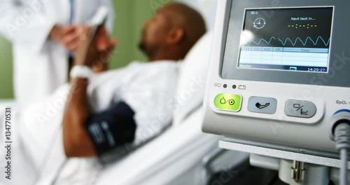 Close-up of heart rate monitor in icu at hospital