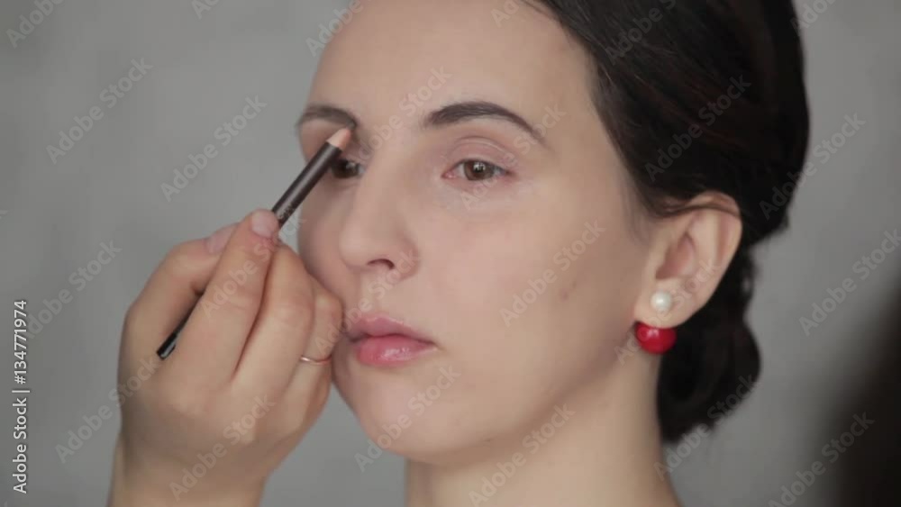 make-up artist working with model make-up artist working with model