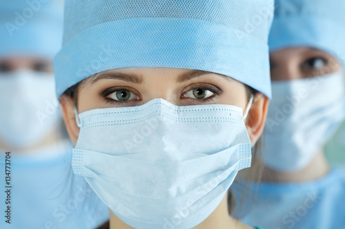 Close up portrait of young female surgeon doctor