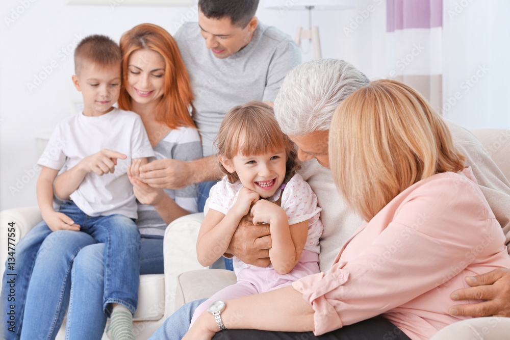 Big happy family sitting on couch Big happy family sitting on couch