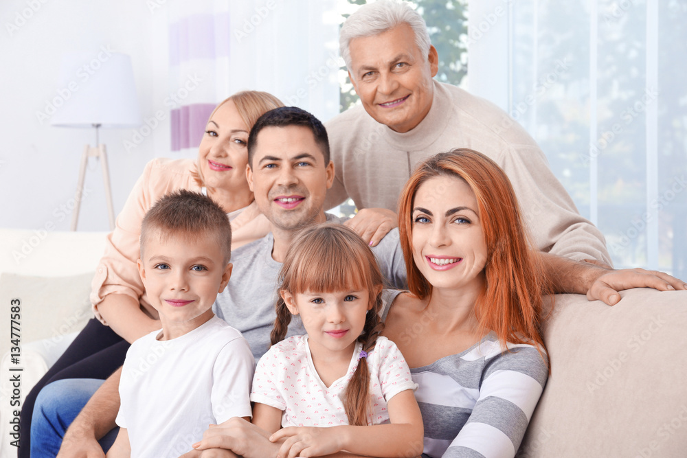 Big happy family sitting on couch