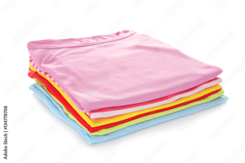 Stack of colorful clothes on white background, closeup Stack of colorful clothes on white background, closeup