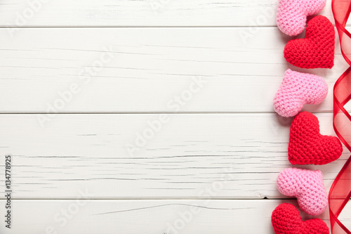 Valentine's day background with crochet hearts