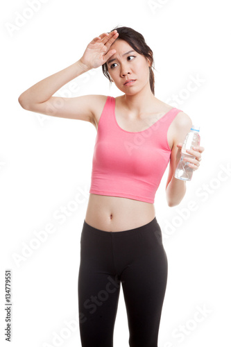 Beautiful Asian healthy girl with bottle of drinking water.