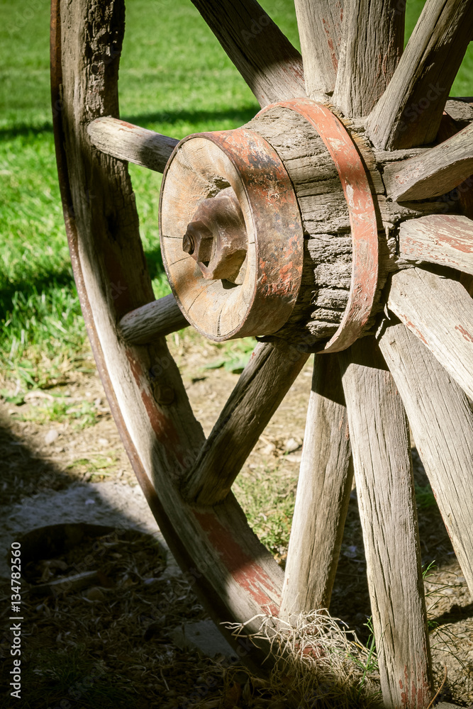 Old Wagon Wheels in Eureka, Old Village, Montana, USA Old Wagon Wheels in Eureka, Old Village, Montana, USA