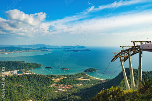 Cable Car to the top of Langkawi island and panoramic view of blue sky, sea and mountain, Malaysia. Langkawi SkyCab is one of the major attractions in the island
