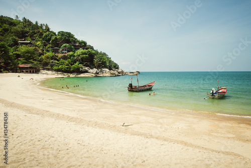 beautiful tropical beach with boats © ninelutsk