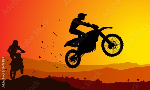 Motorcycle racers jumping from the top  sunset