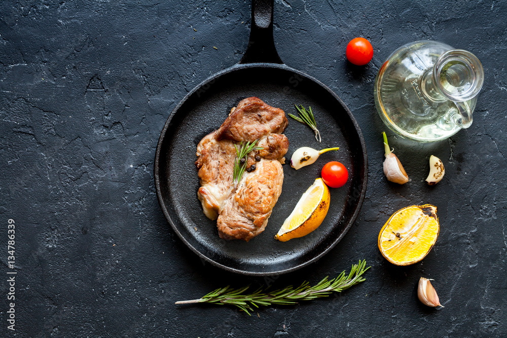concept cooked steak on dark background top view concept cooked steak on dark background top view