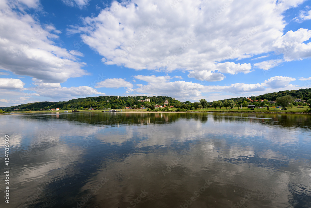 Landscape of beautiful Vistula river at summer day. Reflections of clouds in water. Poland. Kazimierz Dolny, Poland
