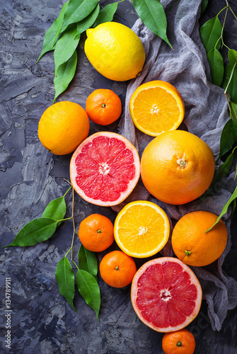 Dissected fresh fruits. Orange, grapefruit and tangerines © Yulia Furman