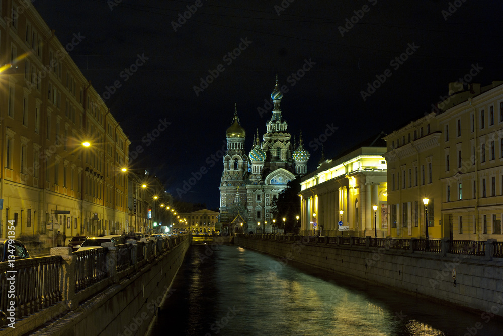 Fototapeta premium Night city view. Church, river and street