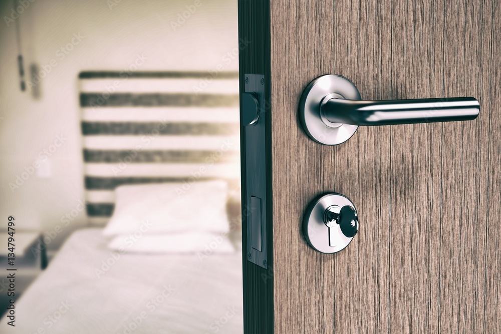 Composite image of brown door with doorknob and key Composite image of brown door with doorknob and key