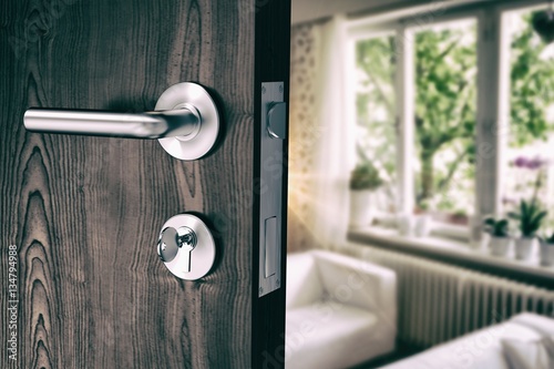 Composite image of brown door with metal doorknob and lock photo