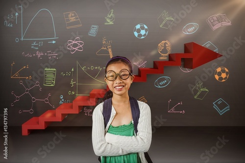 Composite image of girl smiling while standing with arms crossed photo