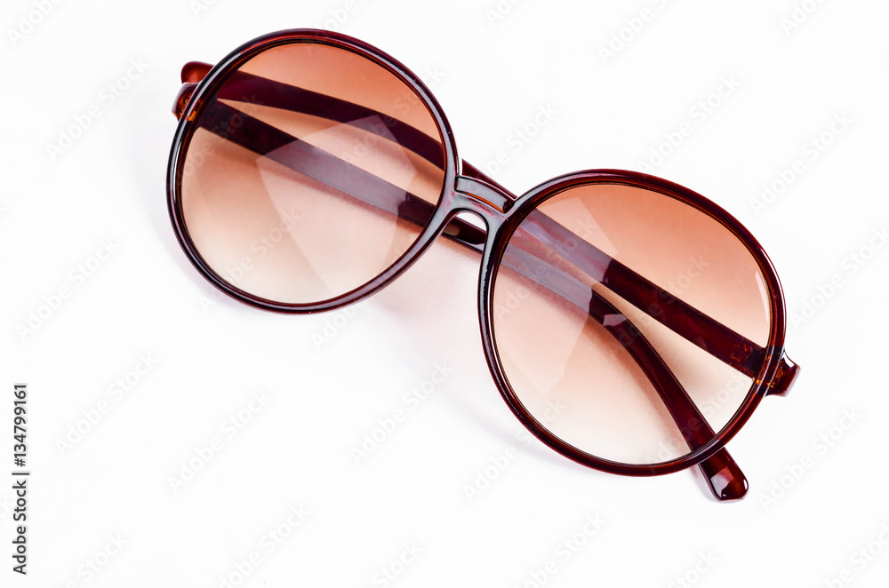 Brown sunglasses isolated on white. Brown sunglasses isolated on white.