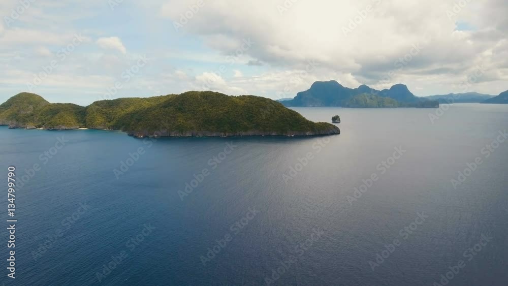Tropical islands, aerial view. Aerial view: sea and the tropical islands. Tropical bay in El Nido. Archipelago El Nido.Philippines National Marine Park. Aerial video. Seascape:sky and mountains rocks Tropical islands, aerial view. Aerial view: sea and the tropical islands. Tropical bay in El Nido. Archipelago El Nido.Philippines National Marine Park. Aerial video. Seascape:sky and mountains rocks