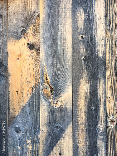 Old textured wood boards with aged discoloration