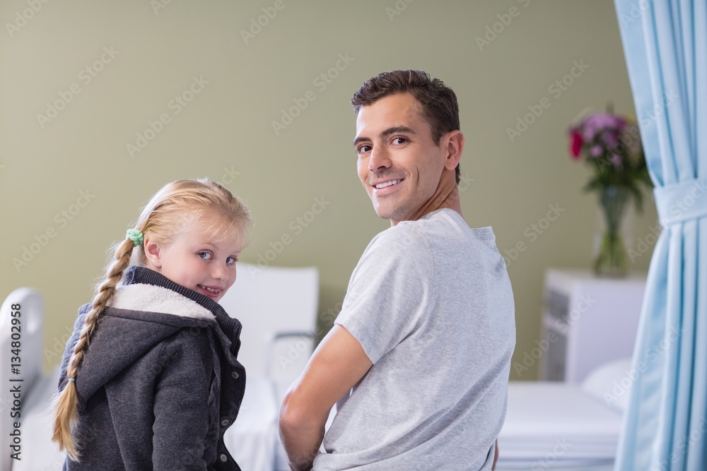 Portrait of daughter comforting her sick father Portrait of daughter comforting her sick father