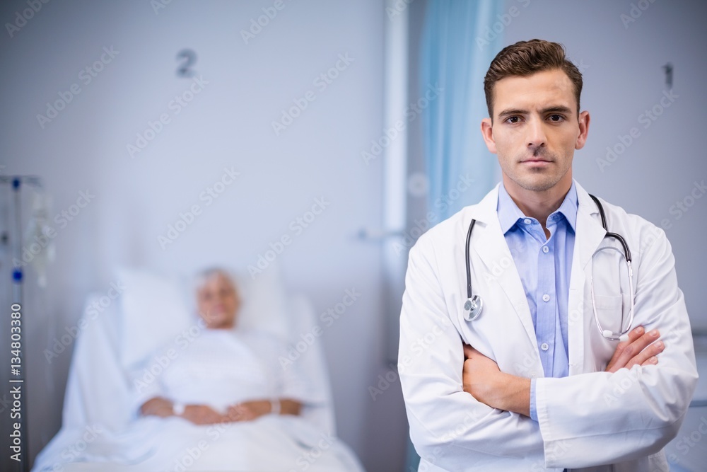 Portrait of doctor standing with arms crossed Portrait of doctor standing with arms crossed