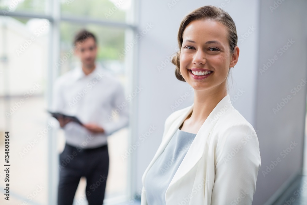 Cheerful businesswoman at conference center Cheerful businesswoman at conference center