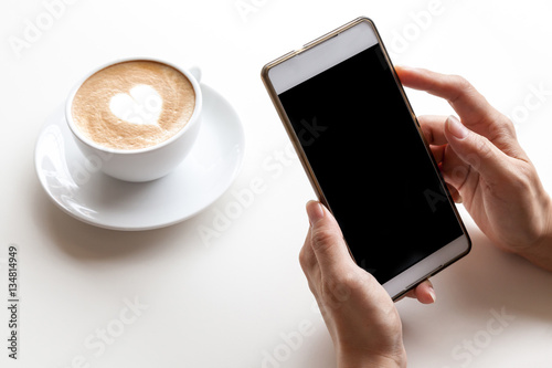 Obraz na płótnie Taking photograph of coffee by smartphone w salonie
