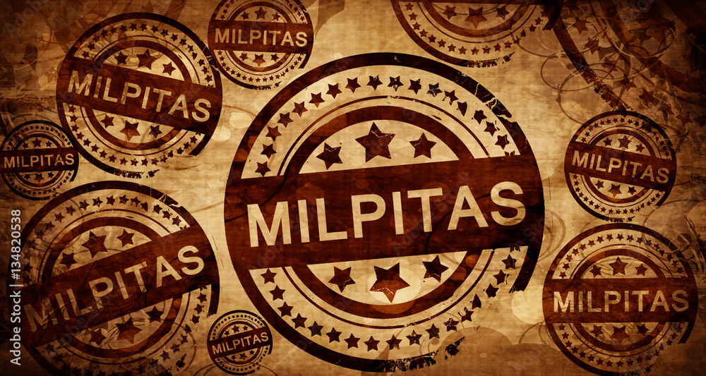 milpitas, vintage stamp on paper background