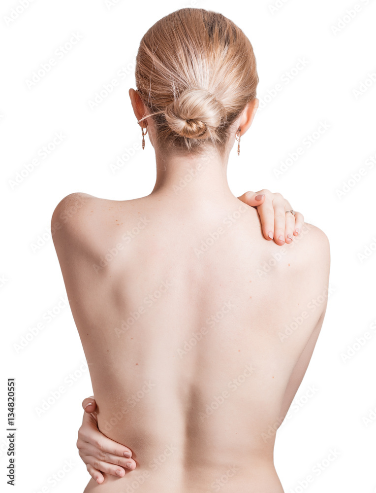 Naklejka premium Woman pressing her hands against a painful shoulder. Isolated on white.