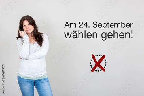 Frau mit Aufruf zum wählen gehen für Bundestagswahl Deutschlan photo