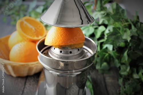 An Image of orange, juicer photo