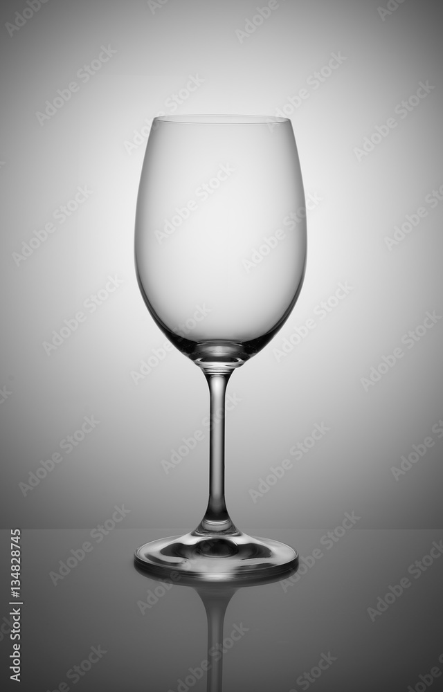 empty wine glass isolated on light gray background empty wine glass isolated on light gray background