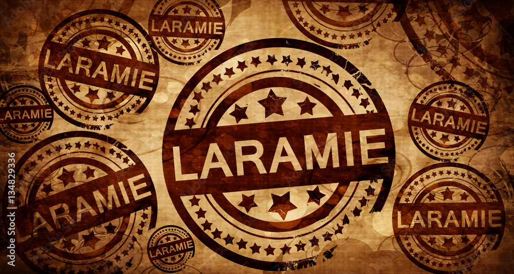 laramie, vintage stamp on paper background