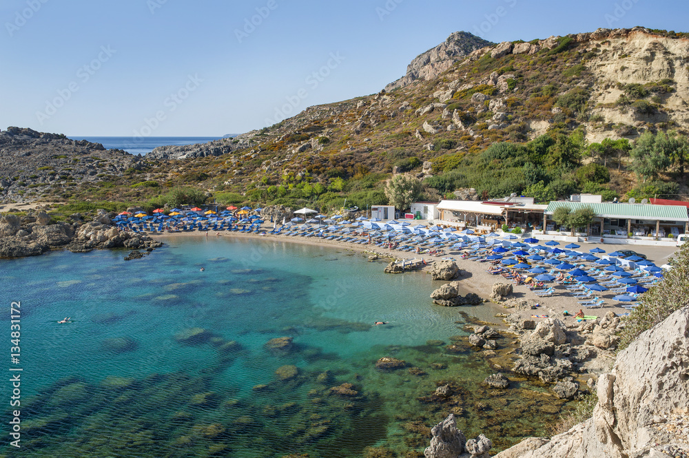 Ladiko beach Rhodes Island, Greece: Ladiko is a small beach located on a beautiful bay 20km south of Rhodes Town and 2km from Faliraki village.