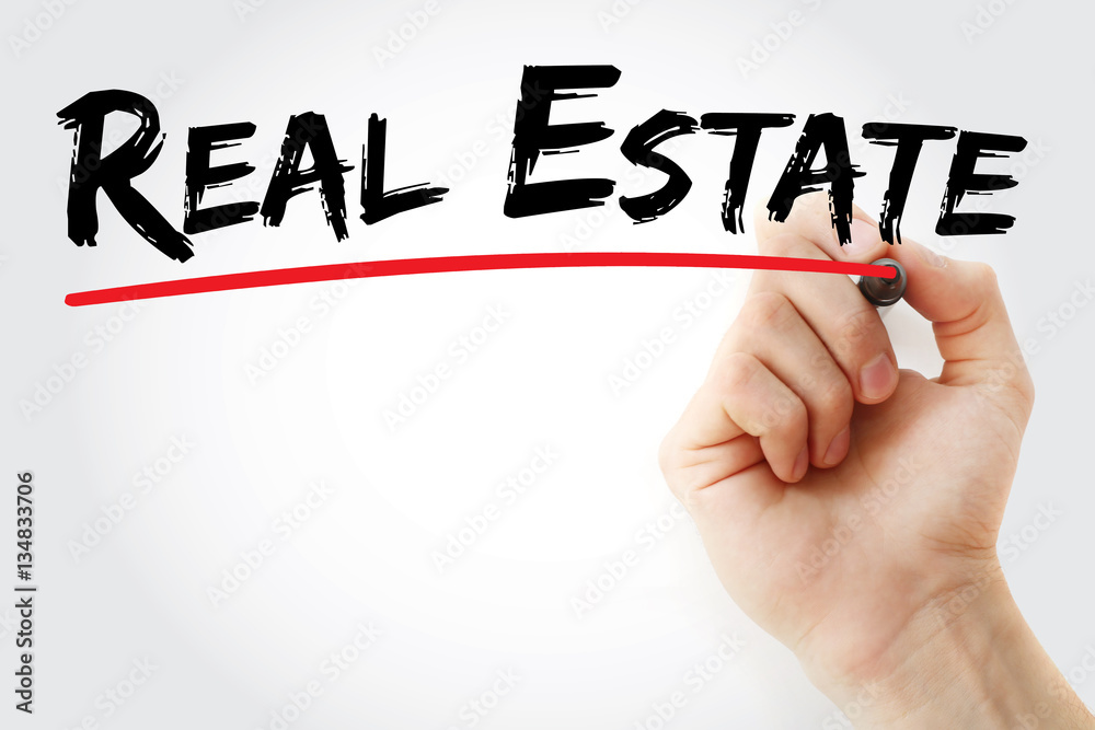 Fototapeta premium Hand writing Real estate with marker, concept background