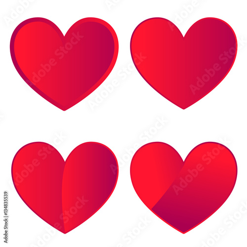 Set of four red hearts on white background