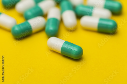 Medication pills on a bright background