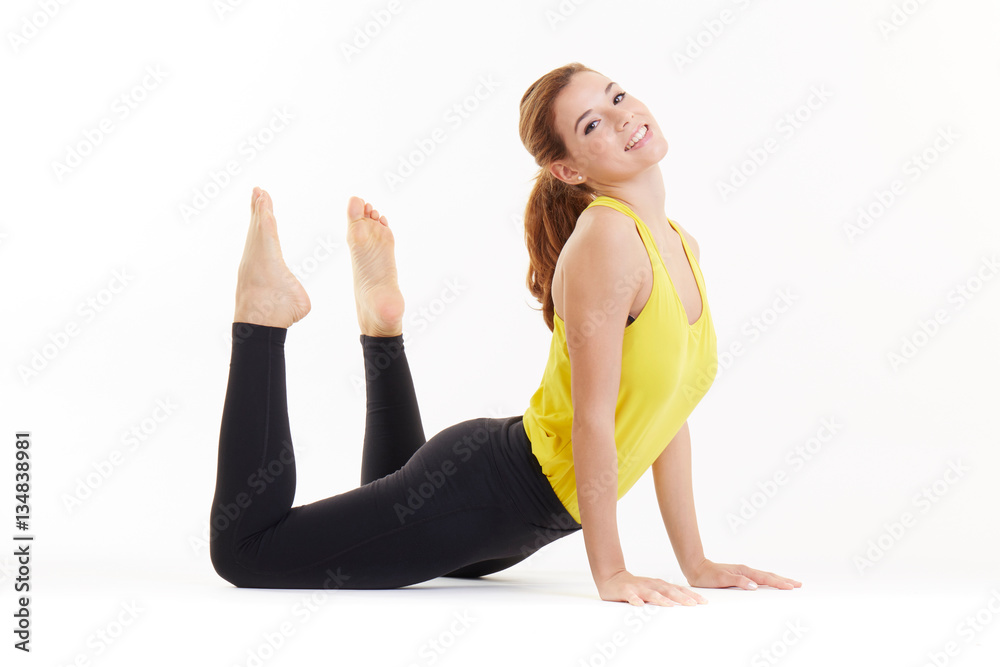 Fit woman stretching her leg to warm up Fit woman stretching her leg to warm up