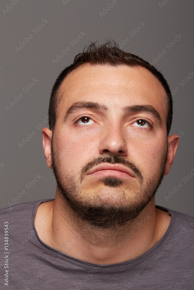 portrait of young bored man portrait of young bored man