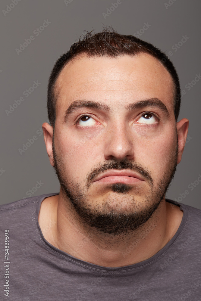 portrait of young bored man portrait of young bored man