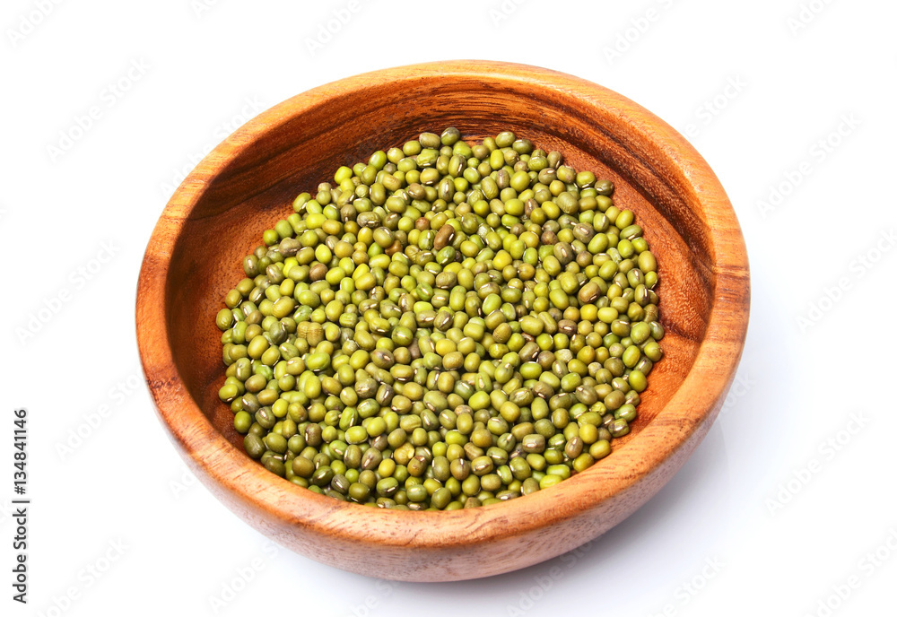 Raw mung bean in a wooden plate. Raw mung bean in a wooden plate.