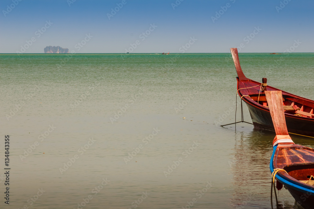 Traditional Thai wooden longtail boats (Rua Hang Yao) in Phuket, Thailand Traditional Thai wooden longtail boats (Rua Hang Yao) in Phuket, Thailand