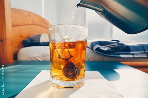 Hot tea in glass cup photo