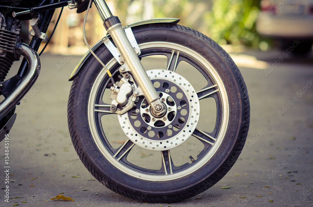 Vintage disc brake with motorcycle wheel.vintage style.