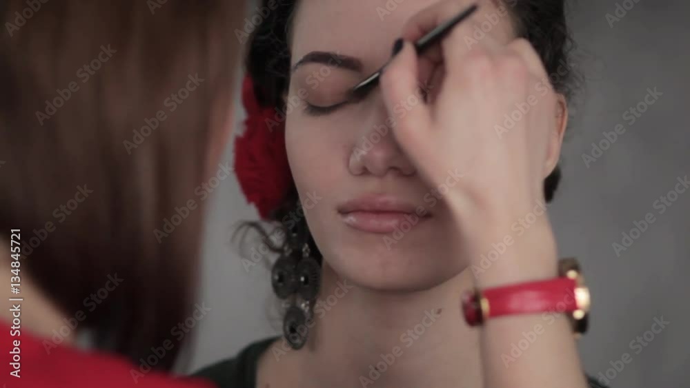 make-up artist working with model make-up artist working with model