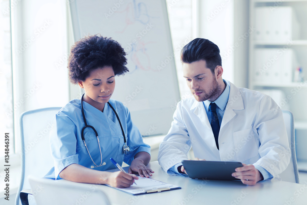 two doctors meeting at hospital office two doctors meeting at hospital office