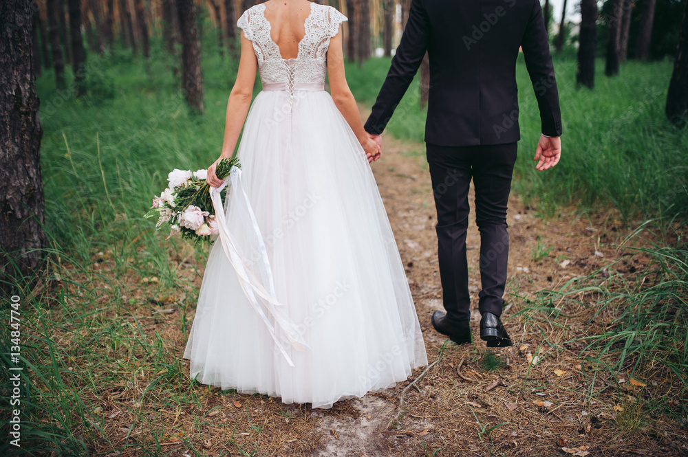 Bride and groom walking together